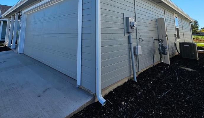 Downspouts installation