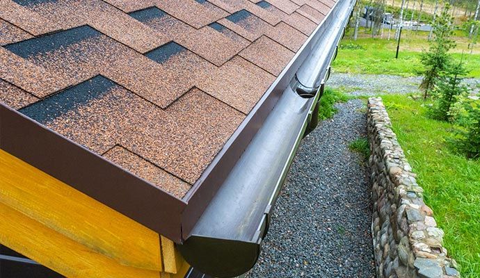 Freshly cleaned residential gutter ensuring proper water flow