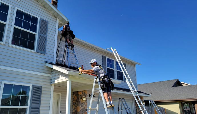 Gutter installation service in residential house.