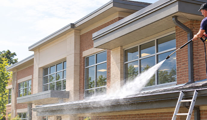 Power washing service for school gutter system