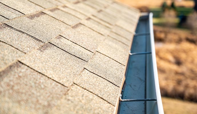 Residential clean gutter roof edge.