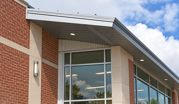 School building exterior with clean gutter system