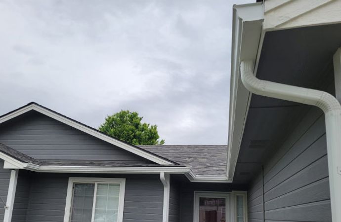 Gutter system installed  on the roofline of a home