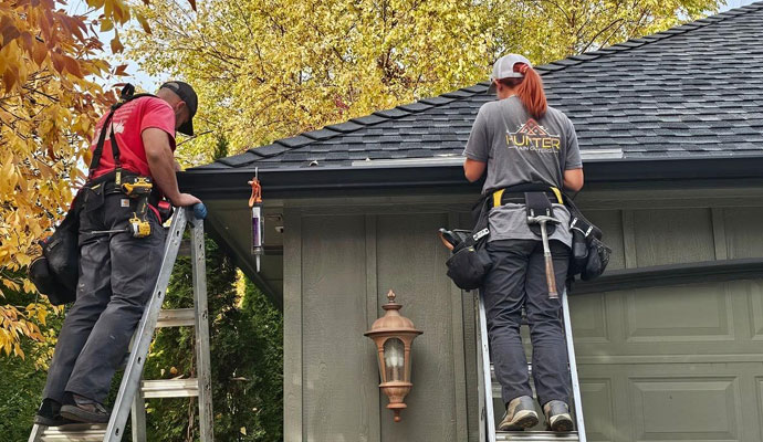 Hunter Rain Gutters professional team providing gutter service