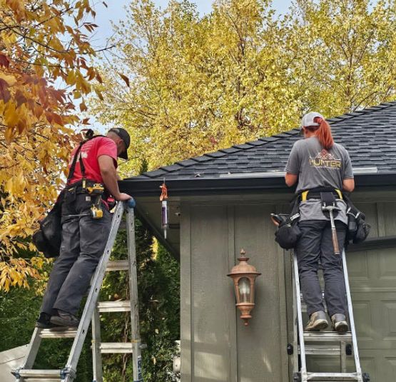 Professional team replacing gutter