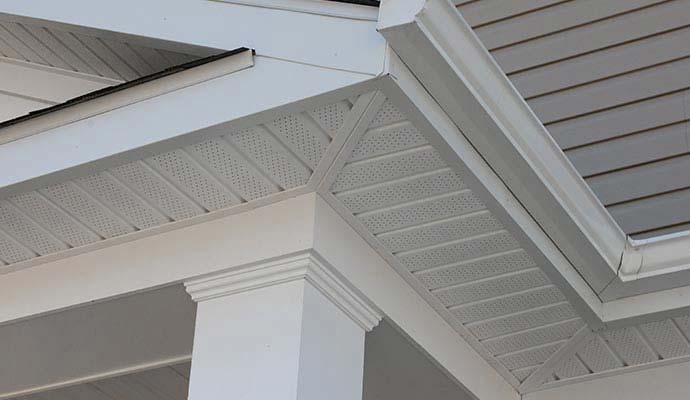 White perforated soffit corner gutter